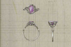 Custom engagement ring design of white gold rings with amethyst on a grid background 