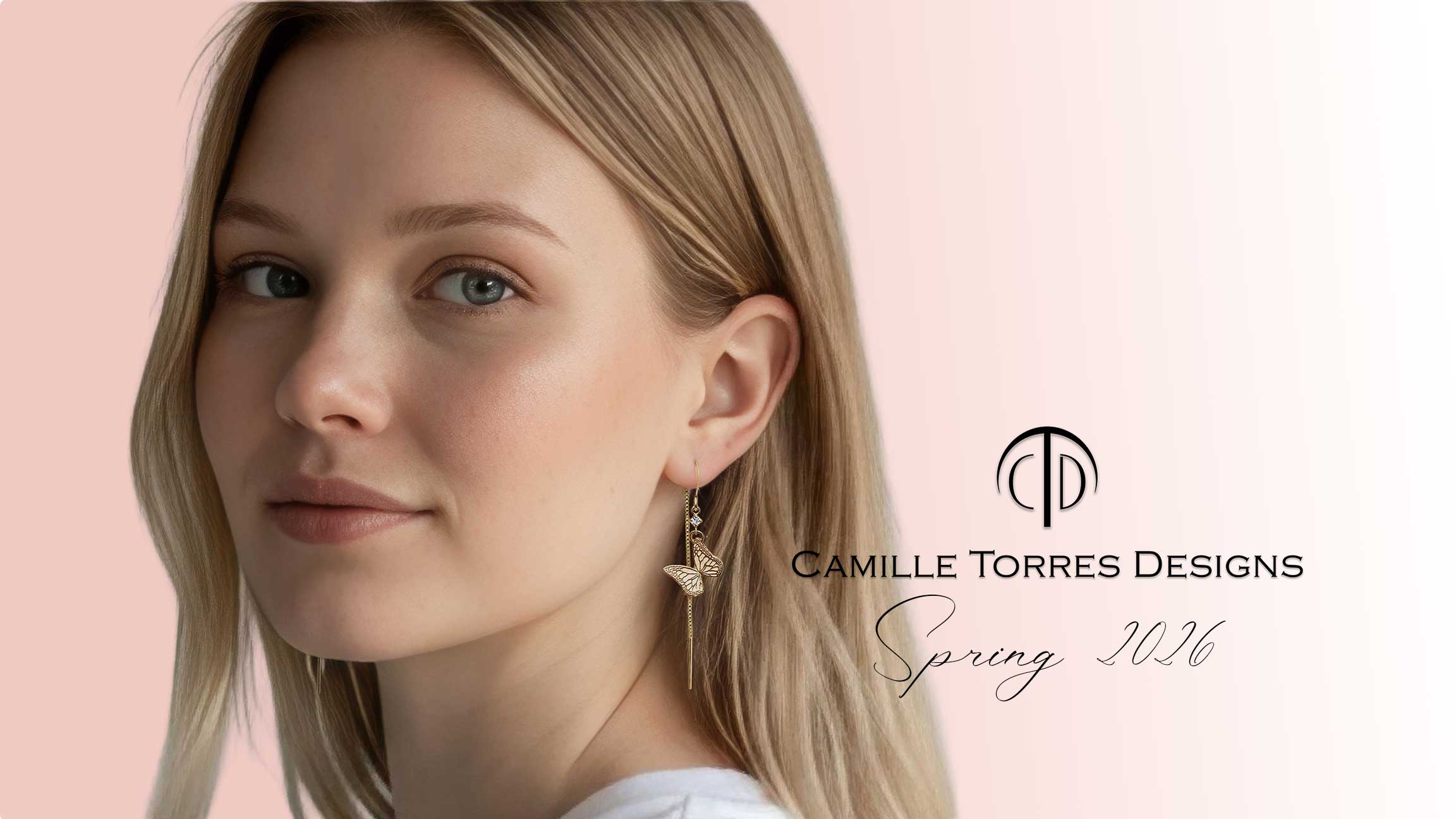 Woman wearing gold and diamond whisper butterfly earrings threaders with 'Camille Torres Designs' branding on a pink background