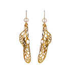 Gold swirl butterfly wing earrings with intricate design on a white background