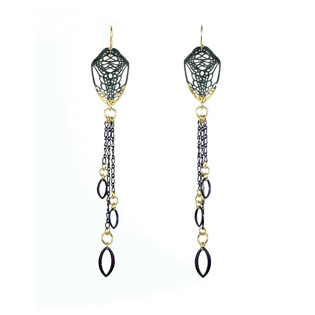 Pair of long, mixed metal 24k gold and silver dangling Cocoon Chanelier butterfly earrings with tassels on a white background