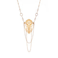 Close-up of 2-inch butterfly cocoon pendant from Opera Length Diaphanous necklace showing intricate cutwork