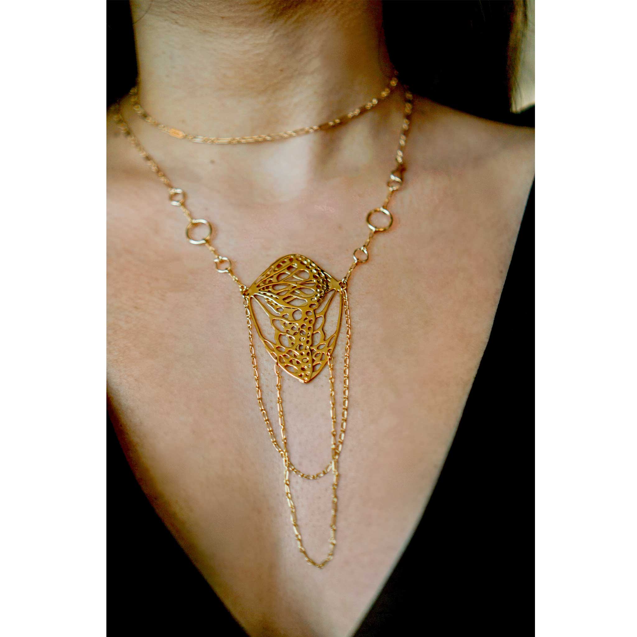 Detail of cascading chain tassels on Opera Length Diaphanous statement necklace