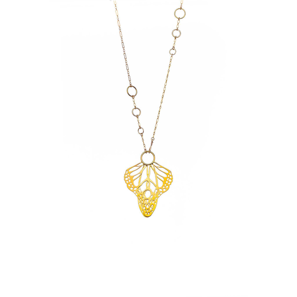 Gold Metamorphosis necklace lariat with butterfly wings  pendant on a white background