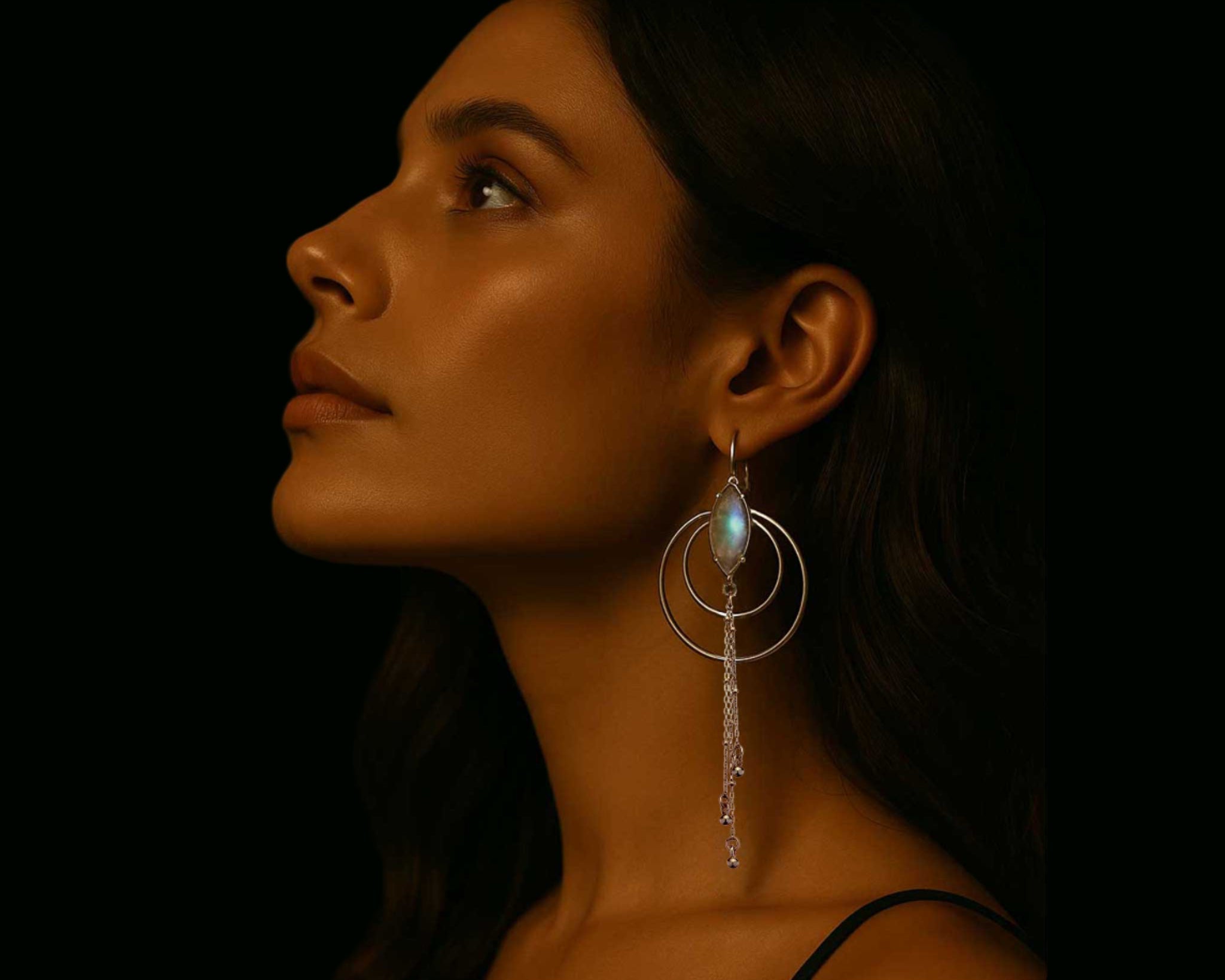 Luna Nouveau Art Nouveau inspired crescent earrings with moonstone worn on model showing elegant drop length.