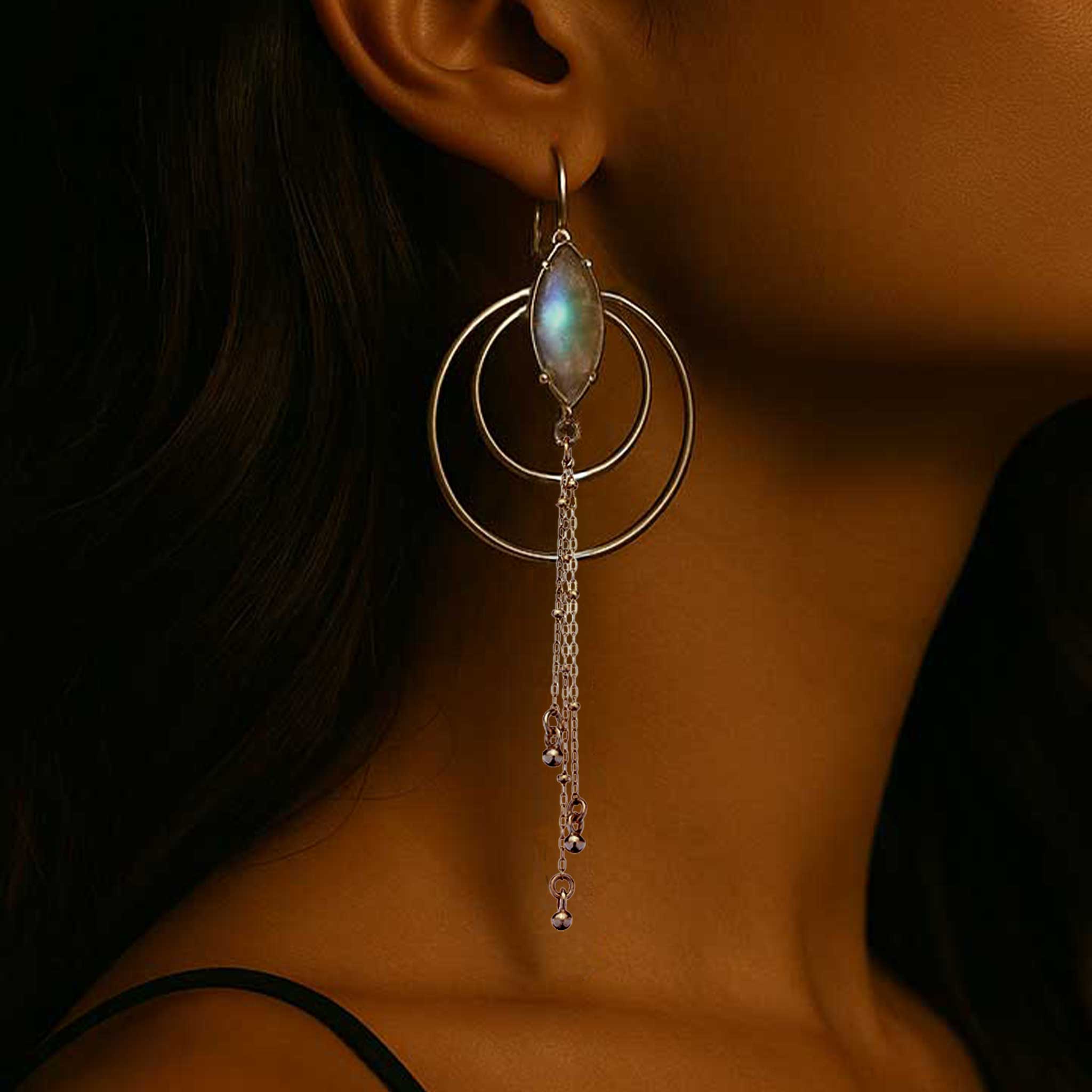 Close-up of Luna Nouveau earrings showing double crescent design with moonstone accent and flowing Art Nouveau curves