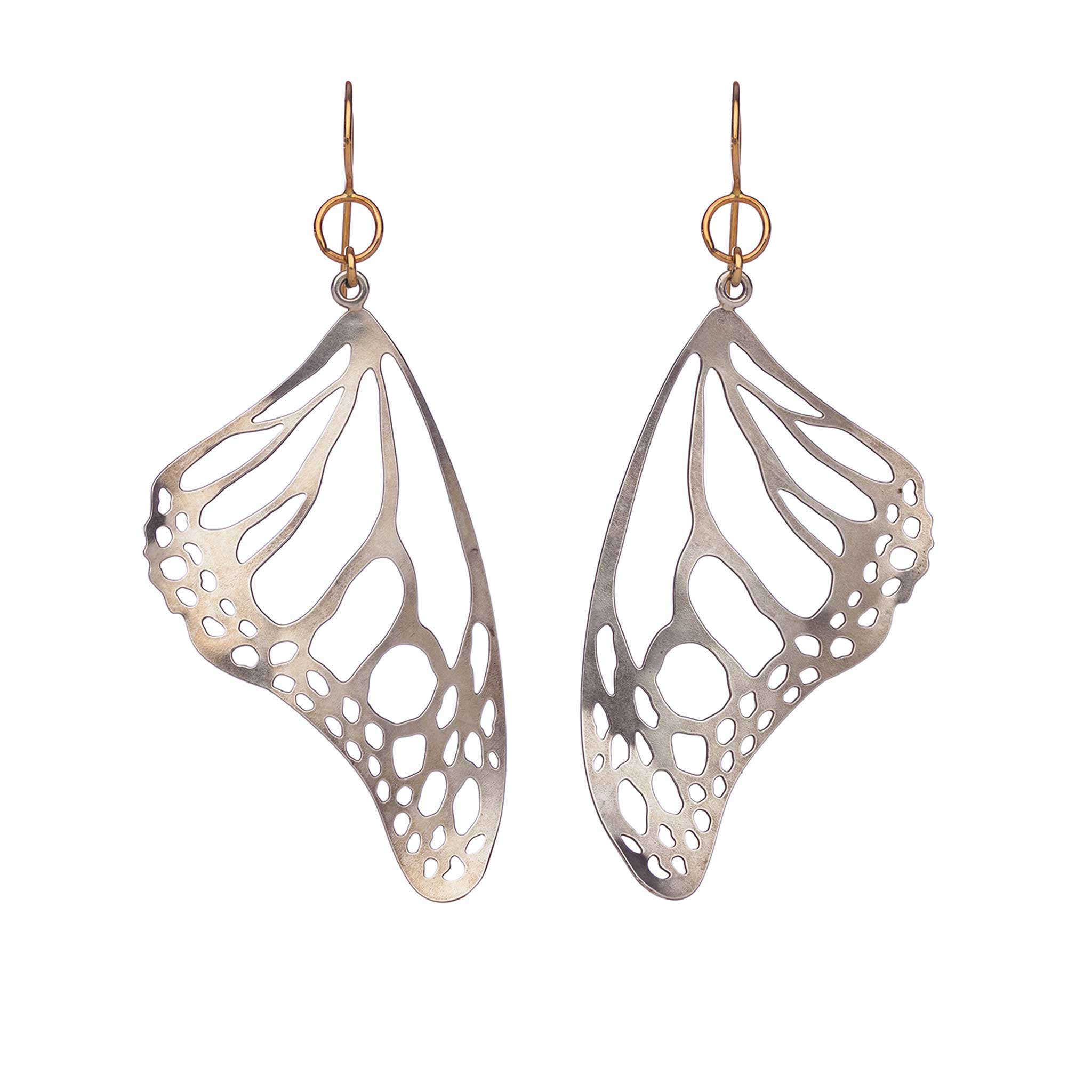 Pair of silver Monarch butterfly wing earrings on a white background