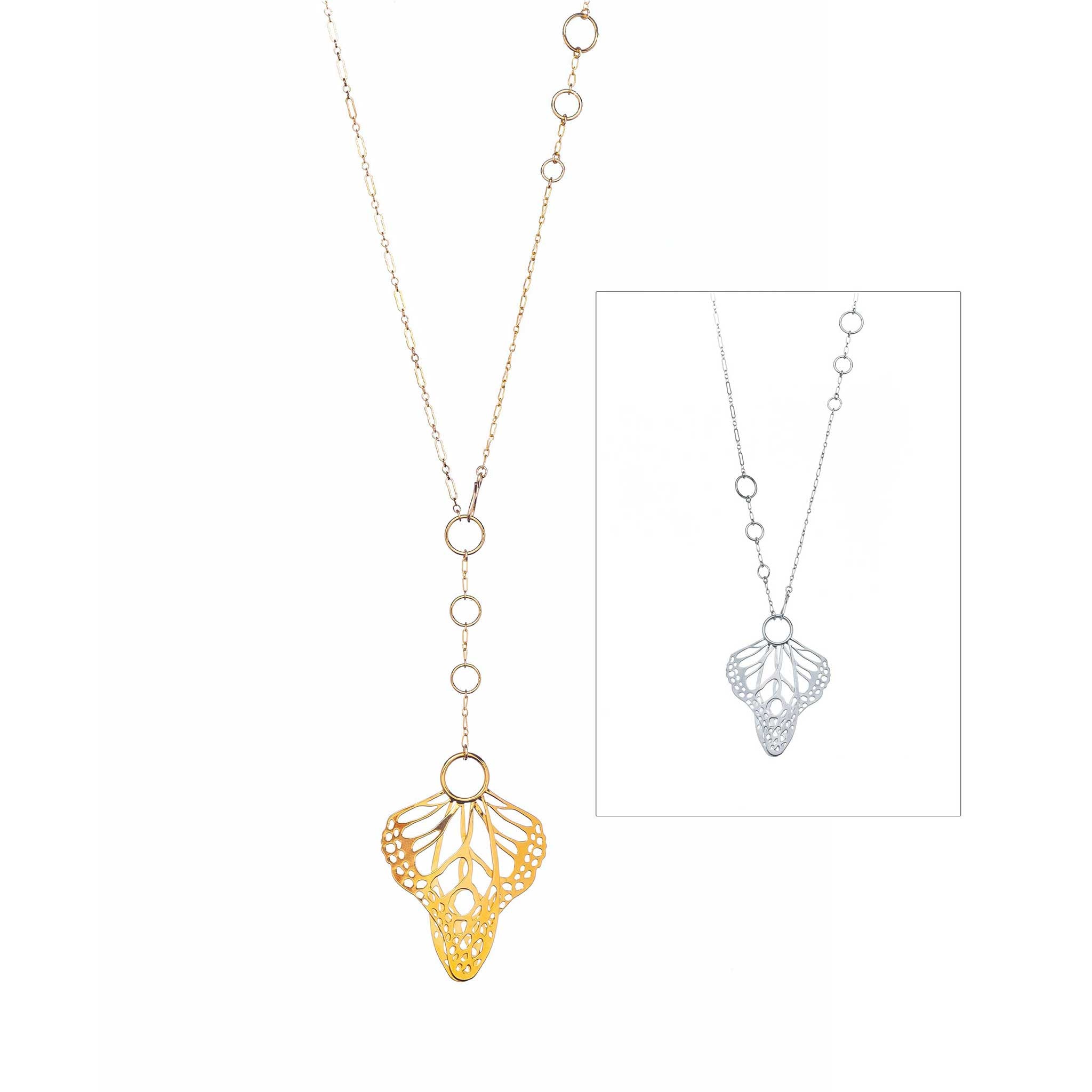 Gold and silver Metamorphosis lariats, showing different ways to clasp on a white background