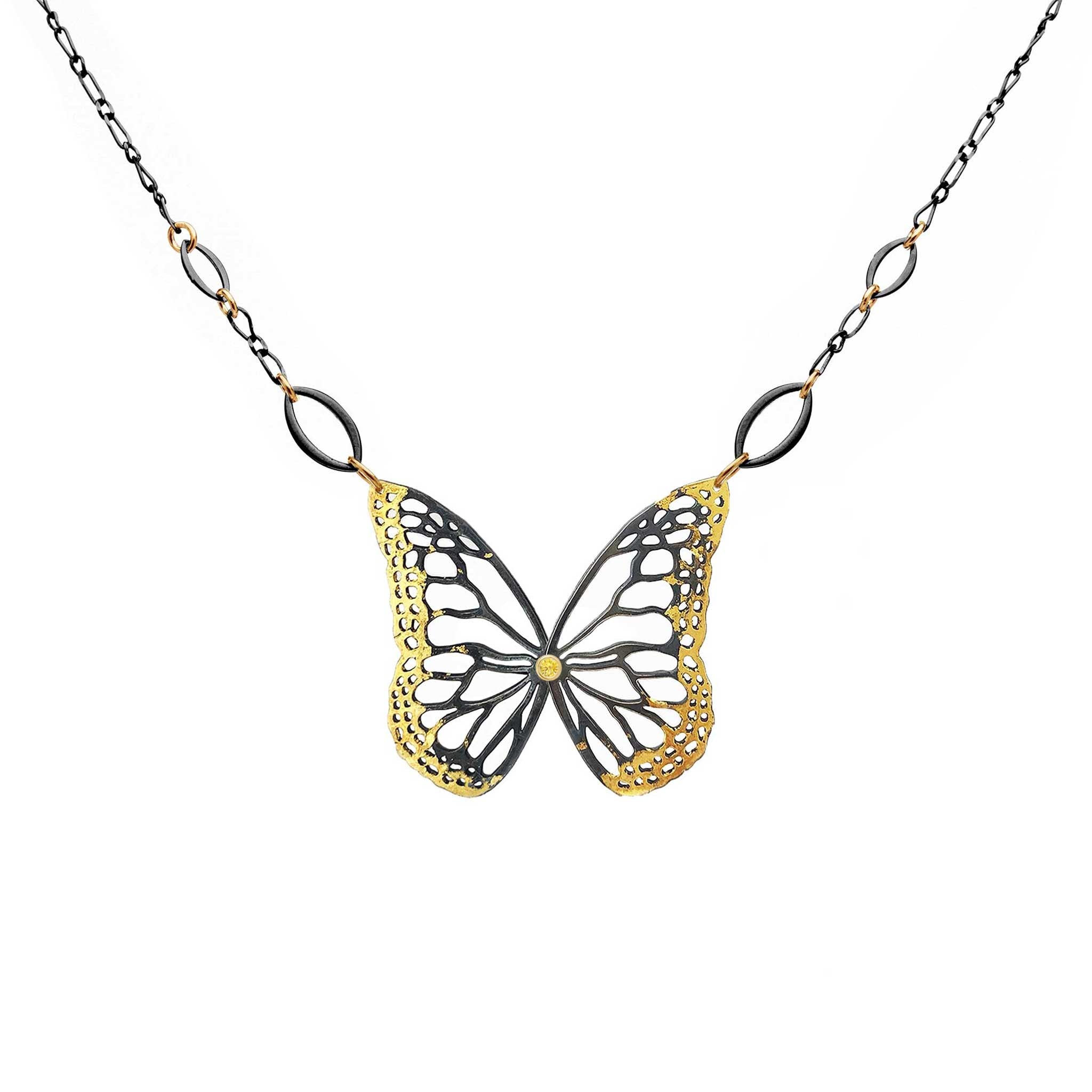 Keum-boo Butterfly pendant with yellow sapphire on a chain with gold and black design