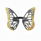 Migration adjustable Keum-boo statement ring with 24k gold 14k gold and black silver over a white background. 