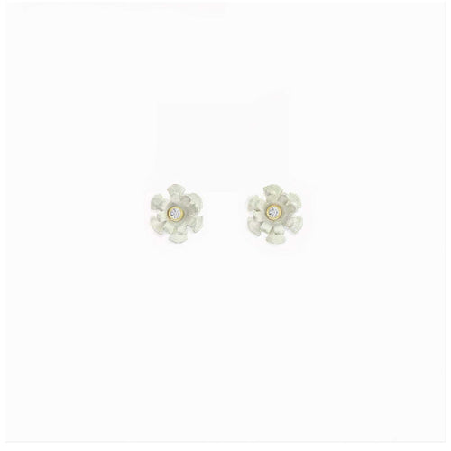 Close up of 7mm Blossom stud showing white matte silver petals with sparkling 1.7mm diamond in gold center