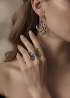 Monarch drop earring paired with Flight diamond adjustable butterfly ring in mixed metal, 24k gold and oxidized sterling silver on a woman.