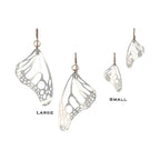 Monarch Butterfly silver wing earrings in large and small sizes on a white background | Camille Torres Designs