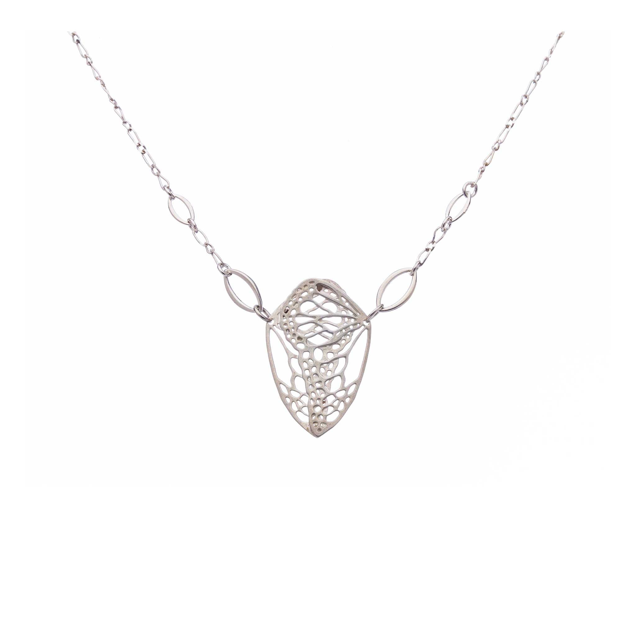Cocoon butterfly wing pendant necklace handcrafted in sterling silver on a white background | Camille Torres Designs