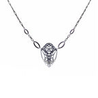 Cocoon monarch butterfly pendant necklace in oxidized silver on a white background | Camille Torres Designs