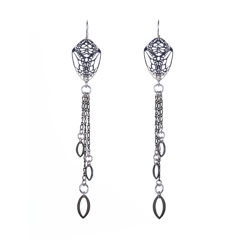 Pair of oxidized silver cocoon butterfly chandelier earrings with tassels, finished with a marquise charm on a white background | Camille Torres Designs