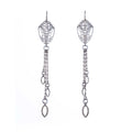 Pair of silver cocoon butterfly chandelier earrings with tassels, finished with a marquise charm on a white background | Camille Torres Designs