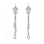 Pair of silver cocoon butterfly chandelier earrings with tassels, finished with a marquise charm on a white background | Camille Torres Designs