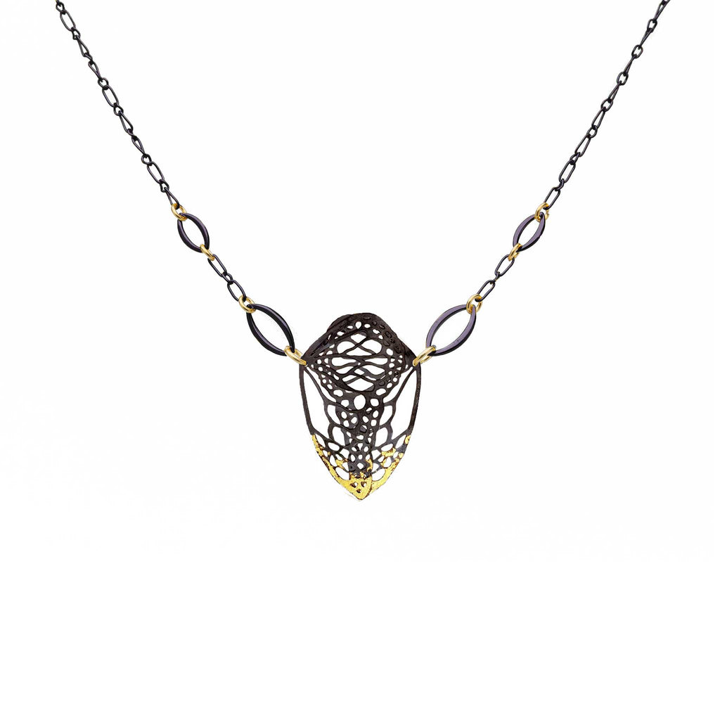 Cocoon monarch necklace in 24k gold gilded oxidized sterling silver keum-boo on a white background