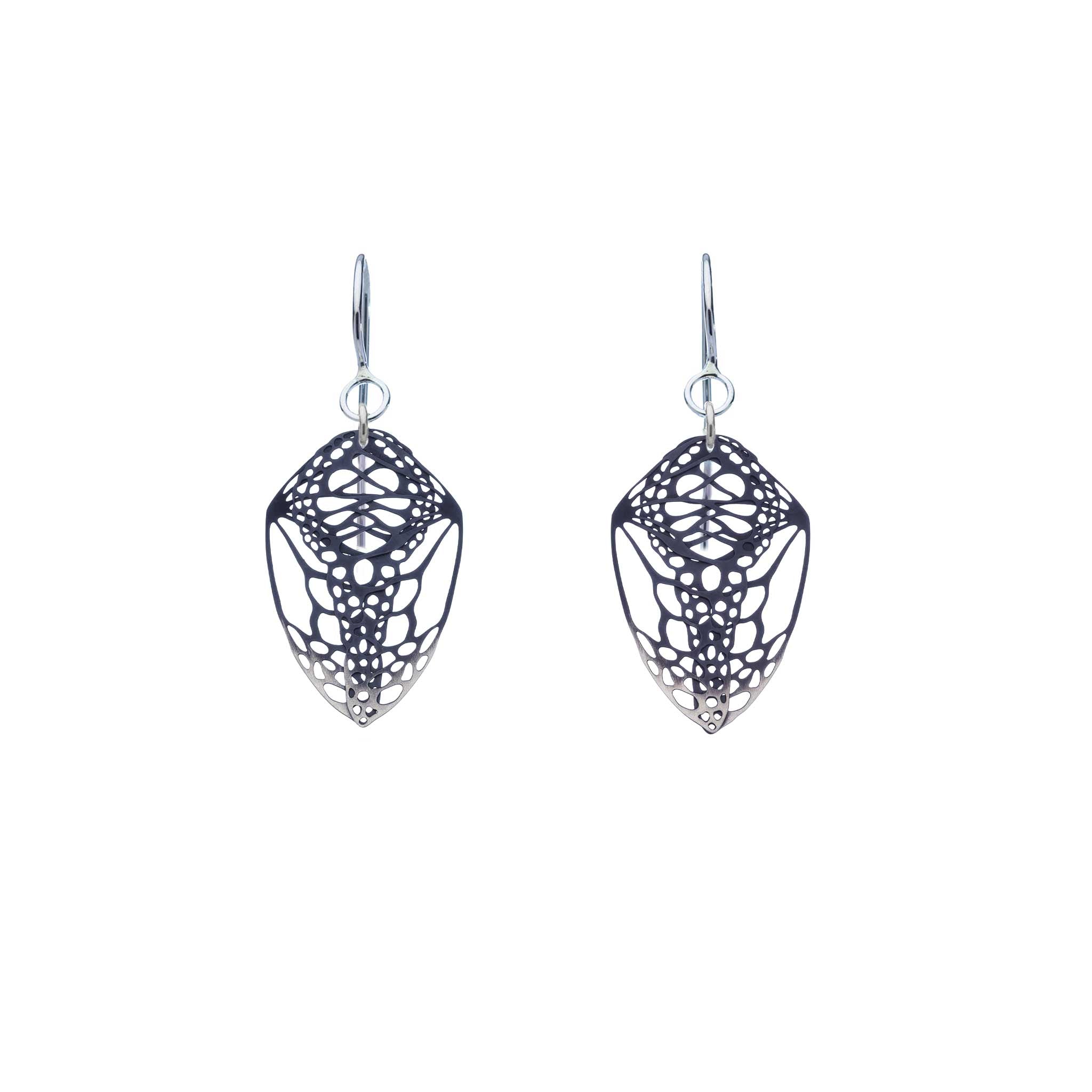 Pair of black silver butterfly Cocoon dangle earrings on a white background
