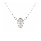 Cocoon monarch butterfly necklace in sterling silver on a white background