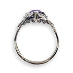 bridge view of custom floral engagement ring with a colored marquise gem in white gold and diamond accents over a white background | Camille Torres Designs