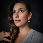 Falling Sky one-of-a-kind threader earrings with rose-cut blue topaz triangles and sterling silver chain worn on model