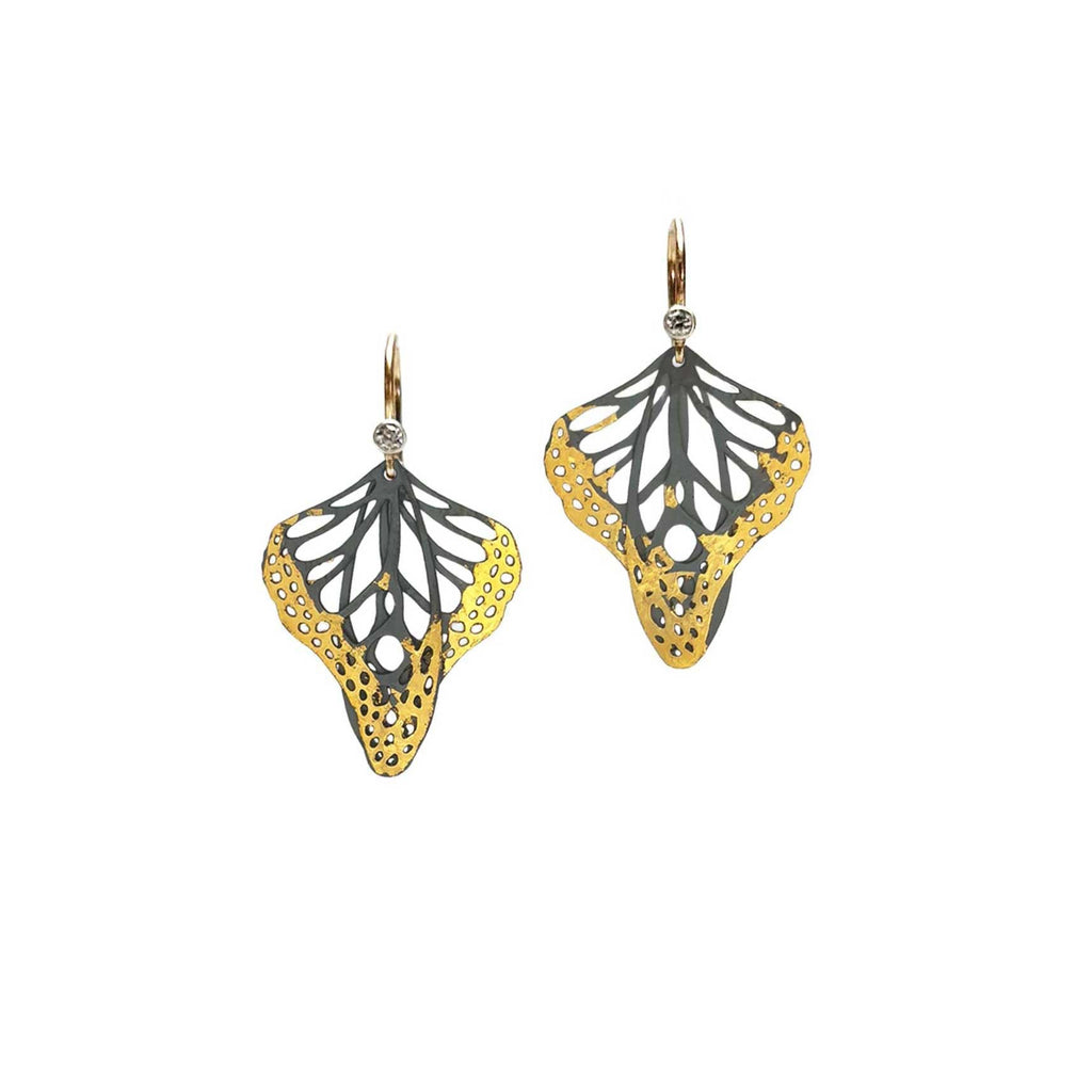 Metamorphosis butterfly earrings with 24k gold and silver earrings with 14k gold and diamonds on a white background 