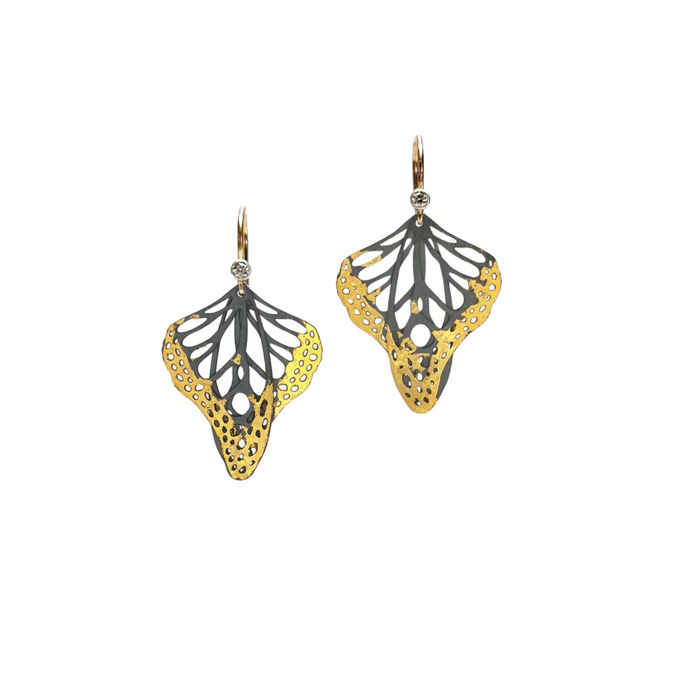 Metamorphosis butterfly earrings with 24k gold and silver earrings with 14k gold and diamonds on a white background 