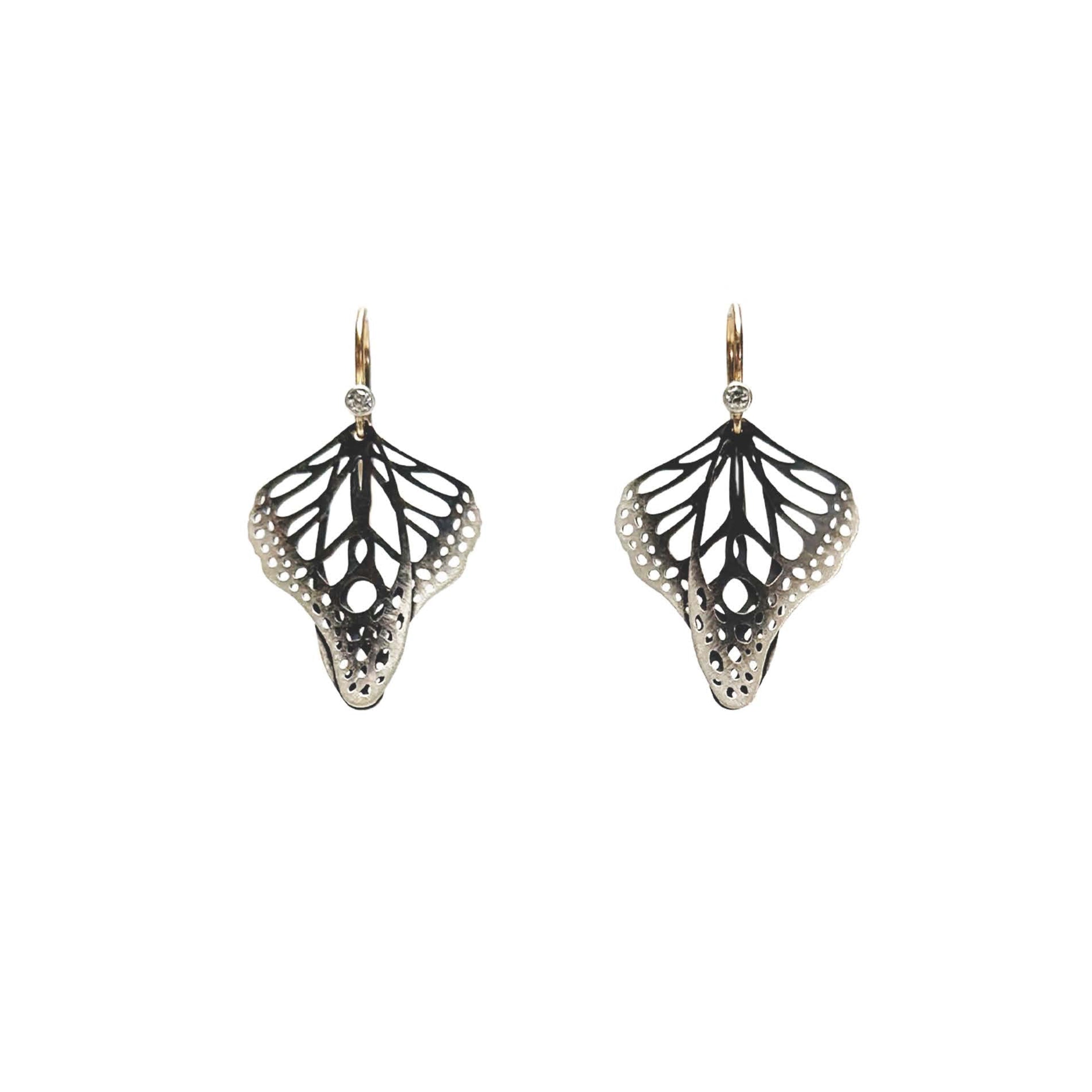 Metamorphosis butterfly drop earrings in oxidized sterling silver with intricate lace wing pattern, 1.5 inches with diamond accent gold ear wires | Camille Torres Designs