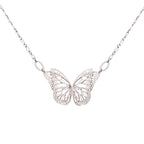 The Migration bright silver butterfly pendant necklace with overlapping 2 wing design, suspended from a delicate silver chain against a plain white background.