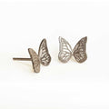 Butterfly sterling silver post earrings on a white background | Camille Torres Designs