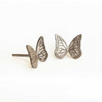 Butterfly sterling silver post earrings on a white background | Camille Torres Designs