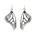 Monarch butterfly wing-shaped black and silver earrings with gold filled ear wire on a white background