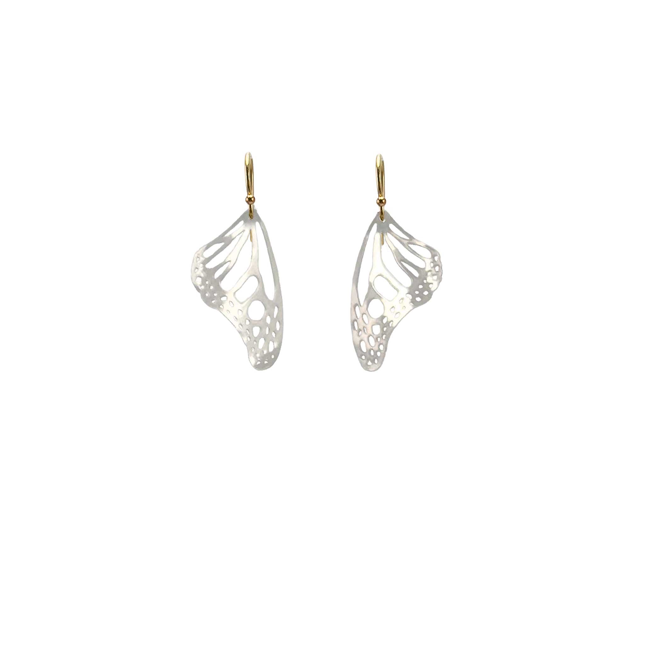 Handmade small Monarch butterfly drop earrings in sterling silver with 14k gold ear wires over a white background | Camille Torres Designs