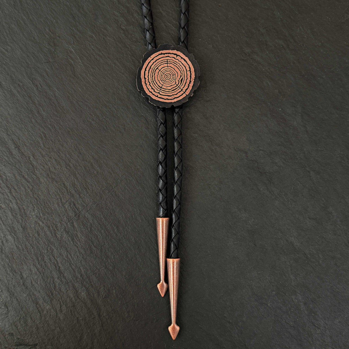 Redwood Slice Bolo Tie – Etched Copper | Braided Leather Cord