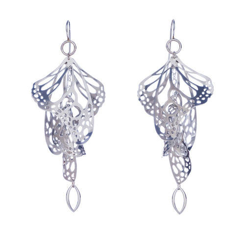 Overwinter chandelier monarch butterfly earrings in bright sterling silver on a white background | Camille Torres Designs