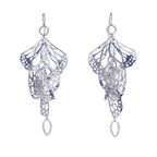 Pair of silver Overwinter monarch chandelier duster earrings on a white background.