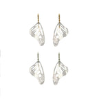 Two pairs of silver Monarch butterfly-wing shaped earrings with gold and silver ear wires on a white background