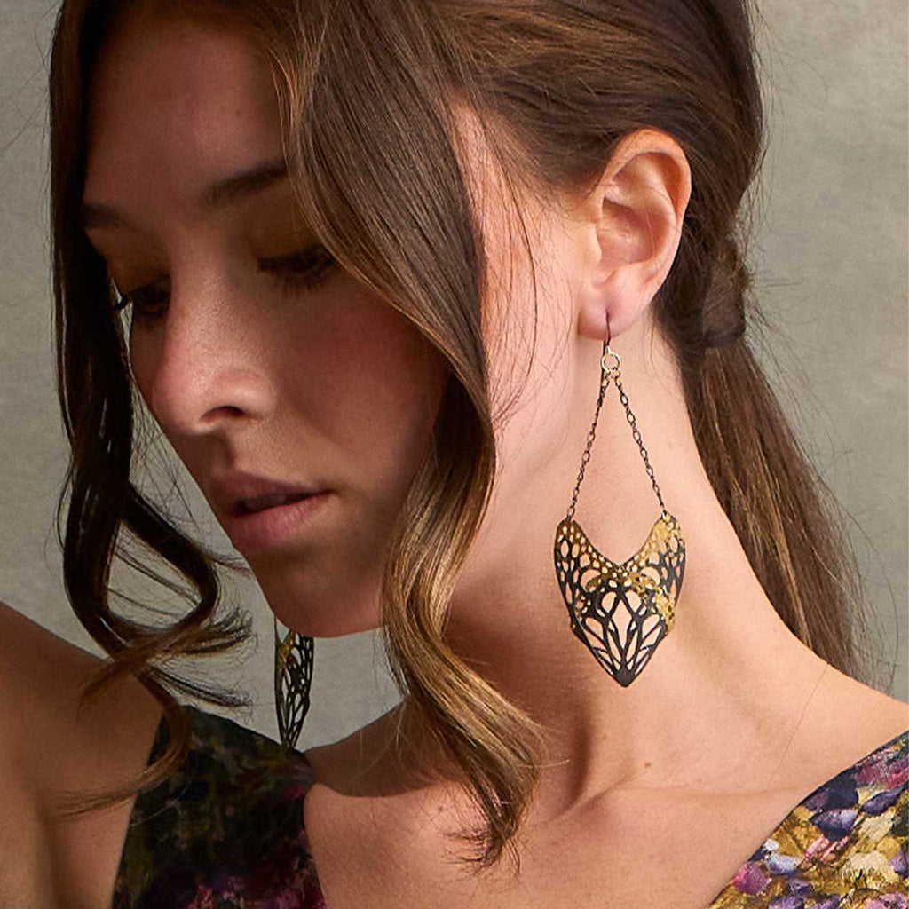 Slumber earrings in keum-boo worn on a model