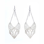 Pair of silver Slumber monarch butterfly earrings on a white background