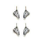 Two pair of Monarch butterfly-wing shaped earrings with silver and gold ear wires on a white background