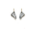 Black Monarch butterfly wing earrings on with gold ear wires on a white background