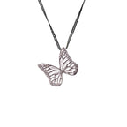 Whisper silver butterfly-shaped pendant on an oxidized chain against a white background