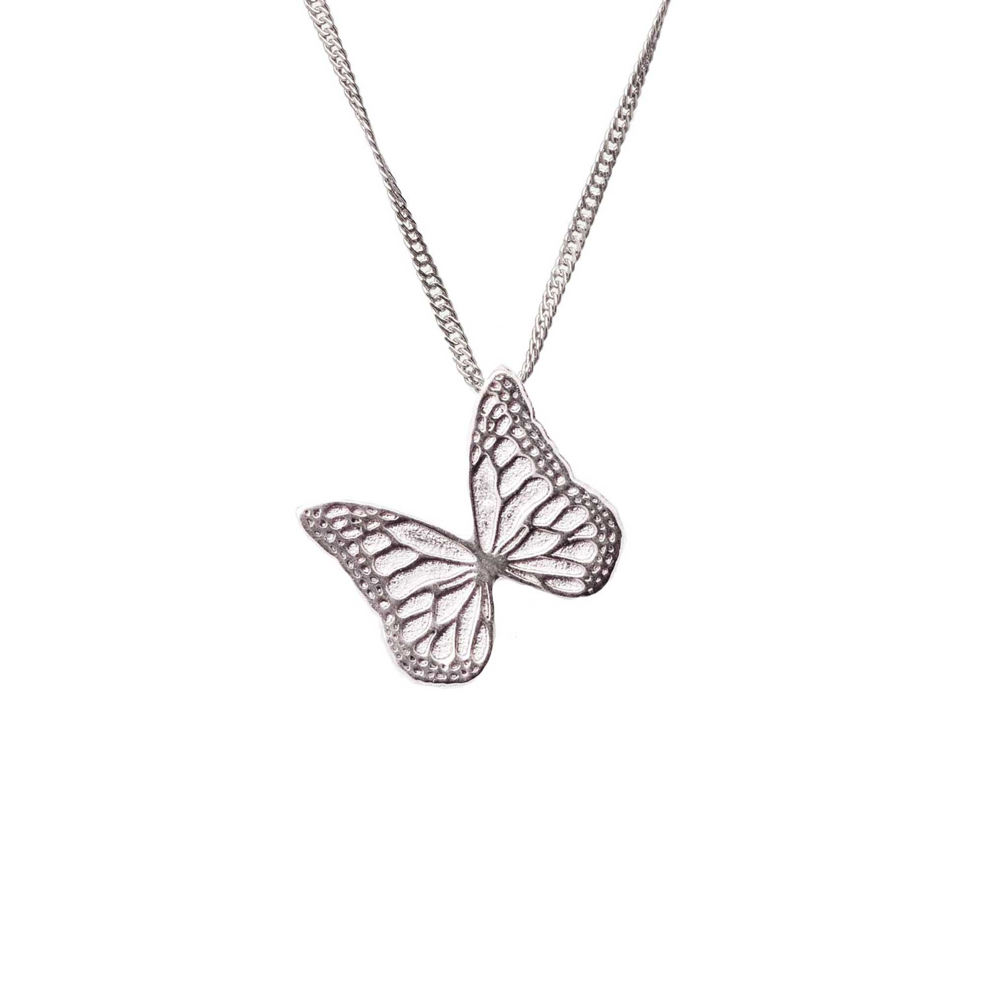 Whisper silver butterfly-shaped pendant on a chain against a white background